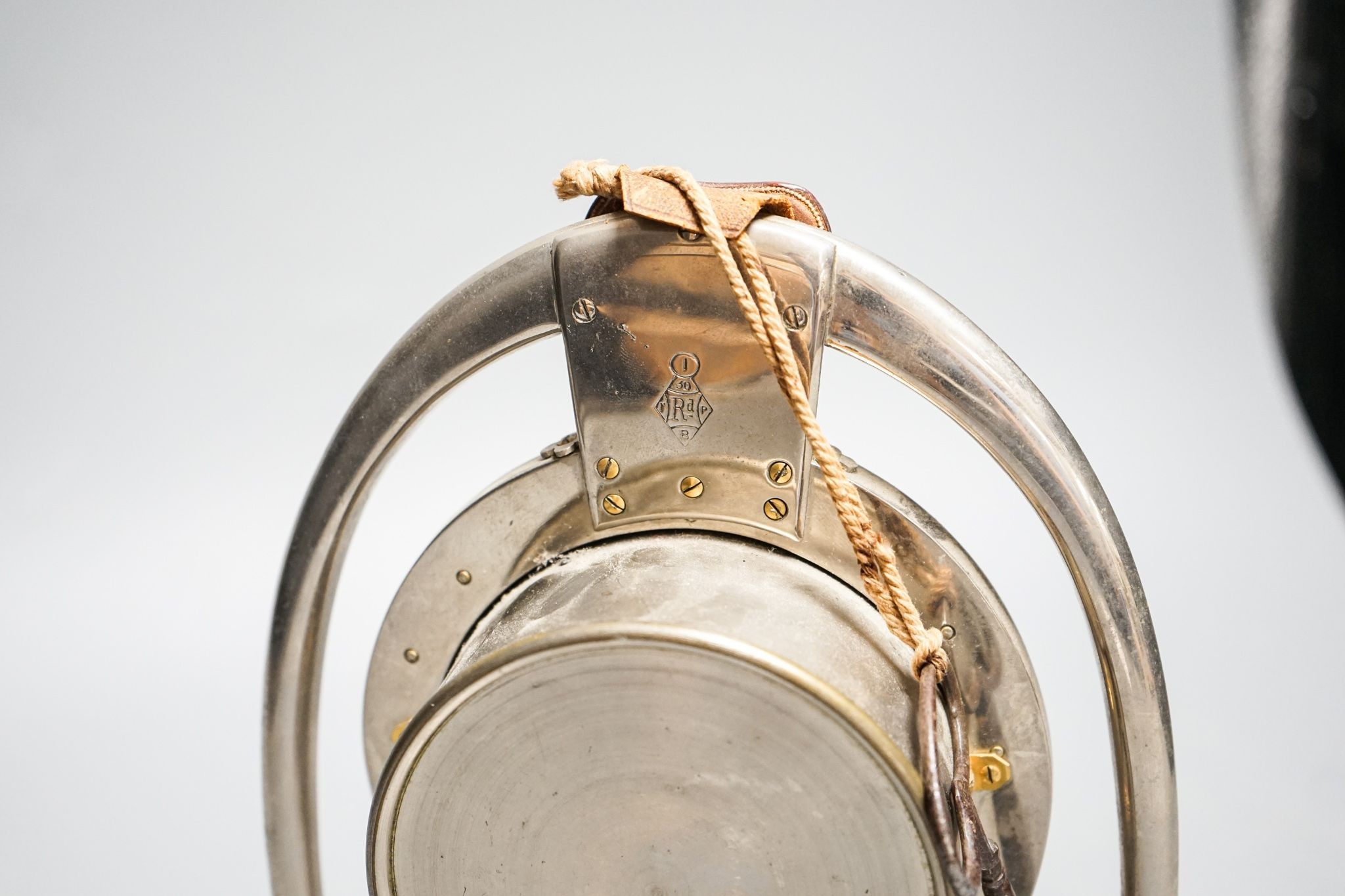 A Victorian patent horseshoe and stirrup mantel clock, French drum movement, the case with registration lozenge mark, with key. 20cm